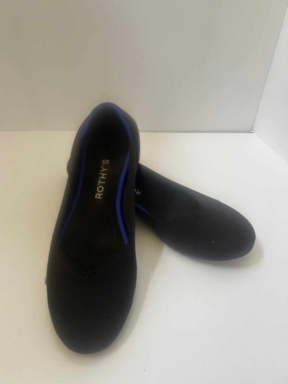 Rothy's Black Flats with Blue Trim